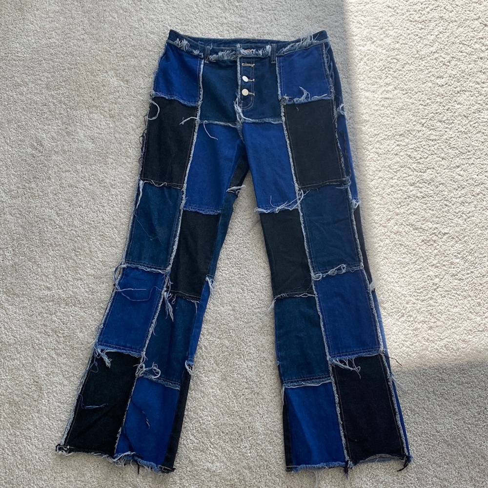 Patched jeans. Women’s size large.